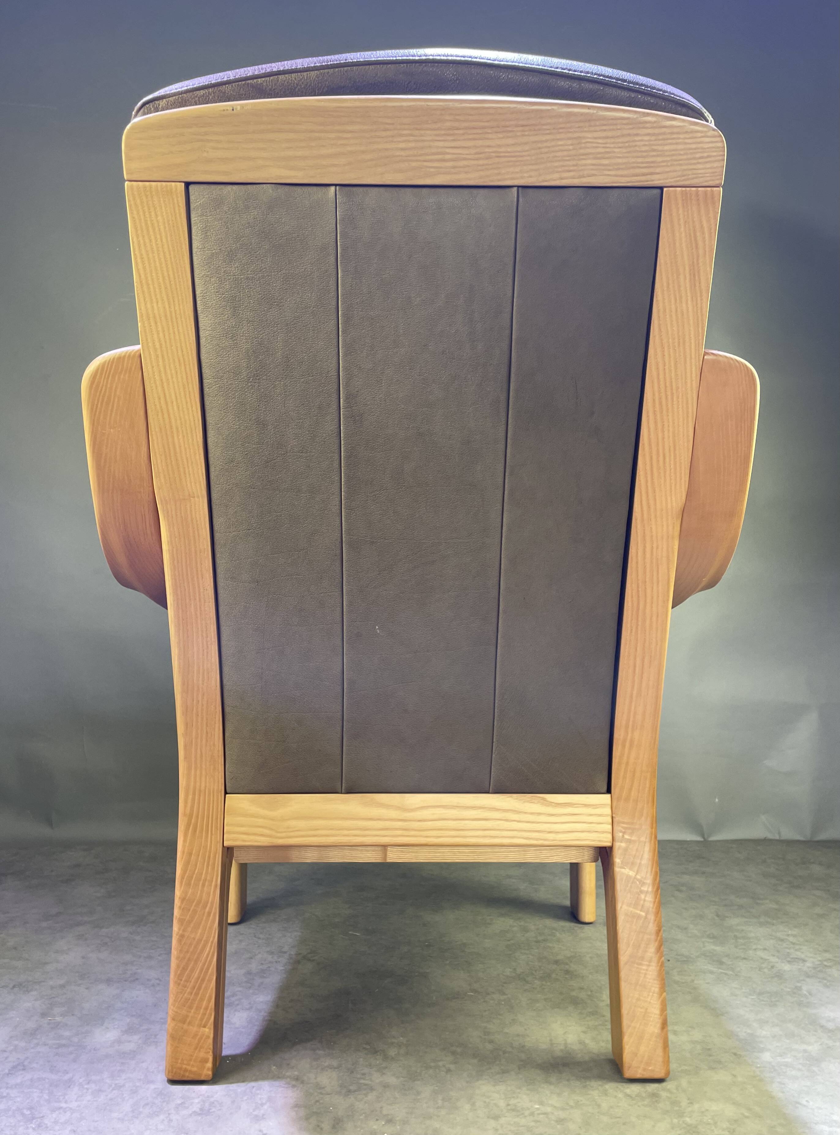 Chocolate leather armchair, wooden structure