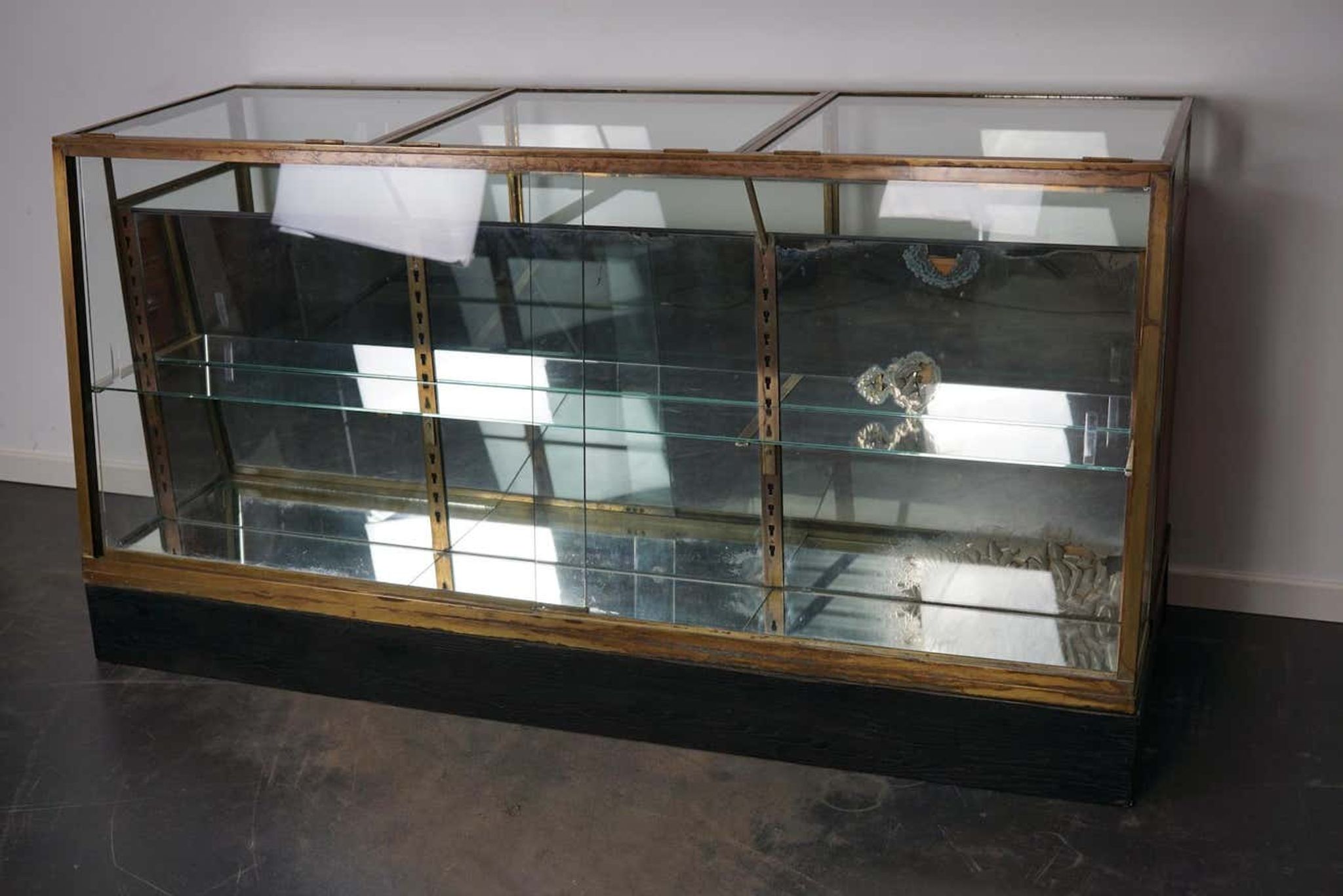 Counter or shop window in oak glass and brass France around 1920