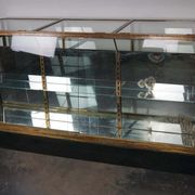 Counter or shop window in oak glass and brass France around 1920