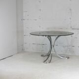 Living room table "Space Age" polished steel, circular slab smoked glass. France, circa 1970.