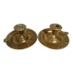 Pair of cave rat candlesticks with brass masks.
