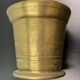 Large mortar & pestle. Chiseled bronze or brass metal, scarified decoration