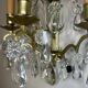 19th-century wall sconce, bronze and crystal pendants.