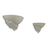 Pair of plaster and frosted glass wall lights, France, 1970.