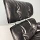 Chaise longue Eames entièrement noire par Herman Miller, années 1970.