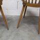Pair of Baumann Menuet chairs, Honey patina, White skai seat
