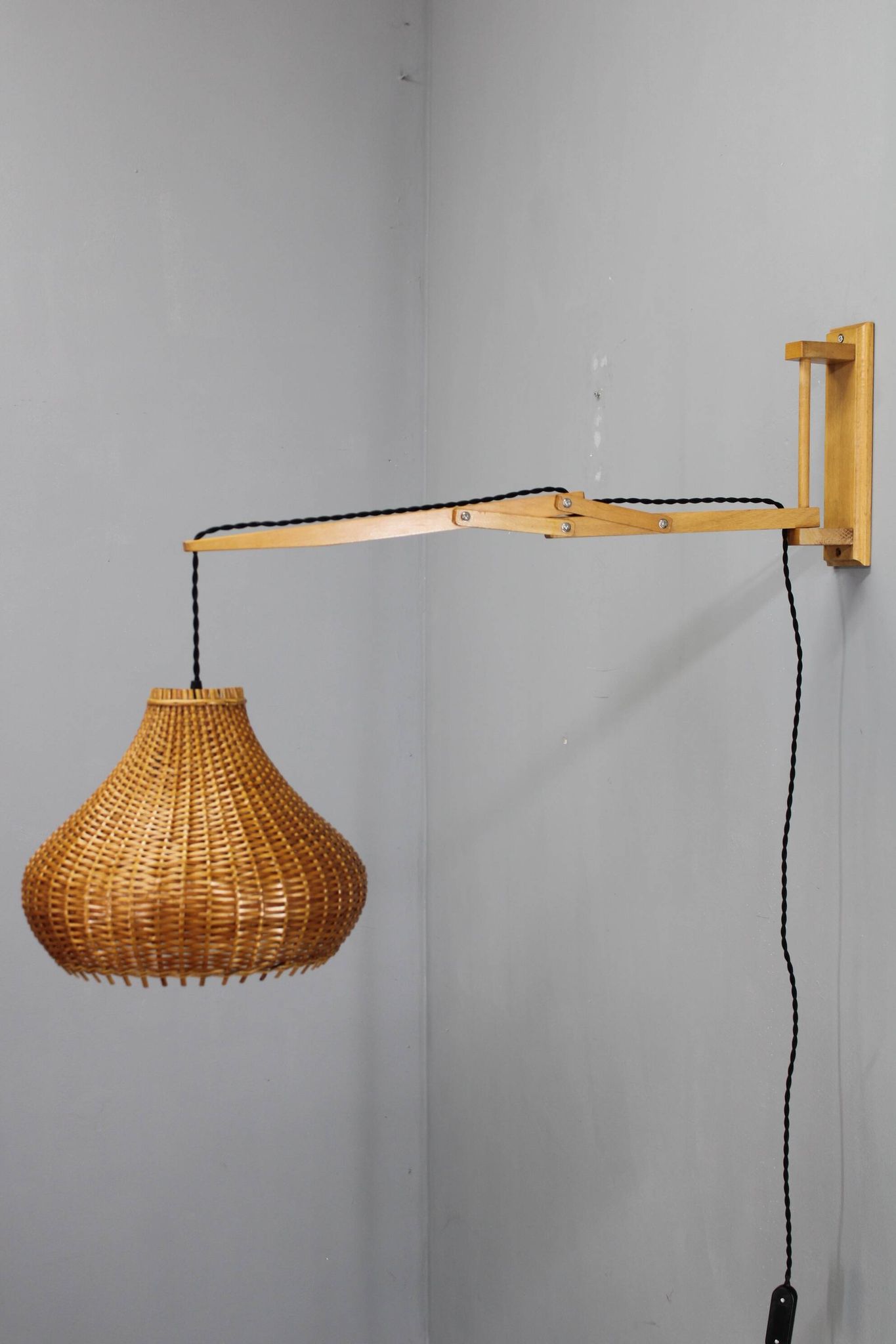 Mid-century adjustable wooden wall lamp with rattan shade, Lipta, 1970s