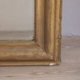 EARLY 20TH CENTURY GOLDEN WOODEN WALL MIRROR DECORATED IN BAROQUE STYLE