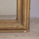 EARLY 20TH CENTURY GOLDEN WOODEN WALL MIRROR DECORATED IN BAROQUE STYLE