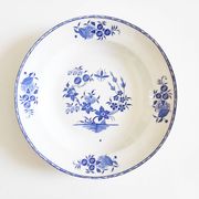 Boch Frères deep plate with large bouquet decoration
