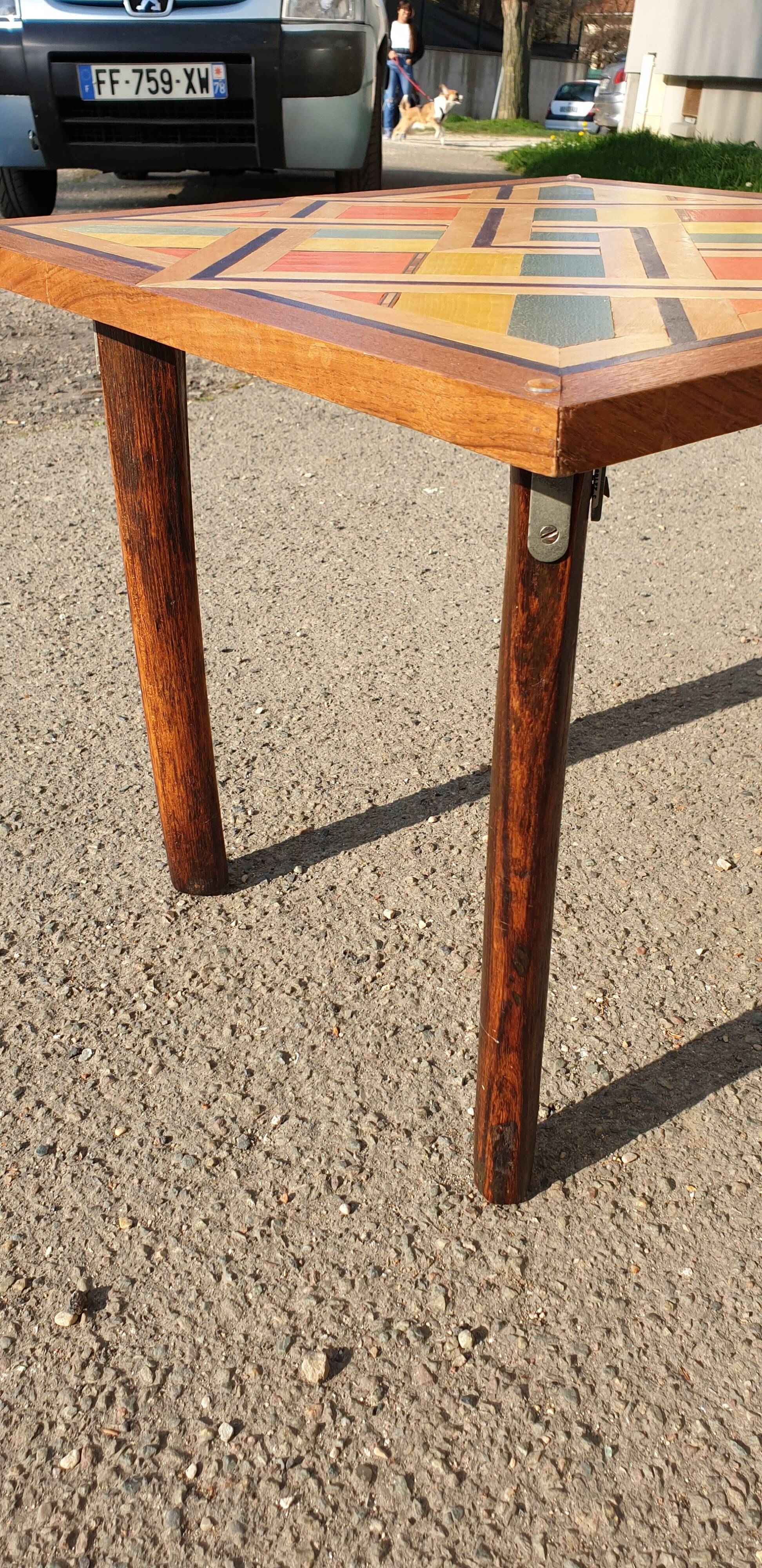 Wooden table with geometric decoration