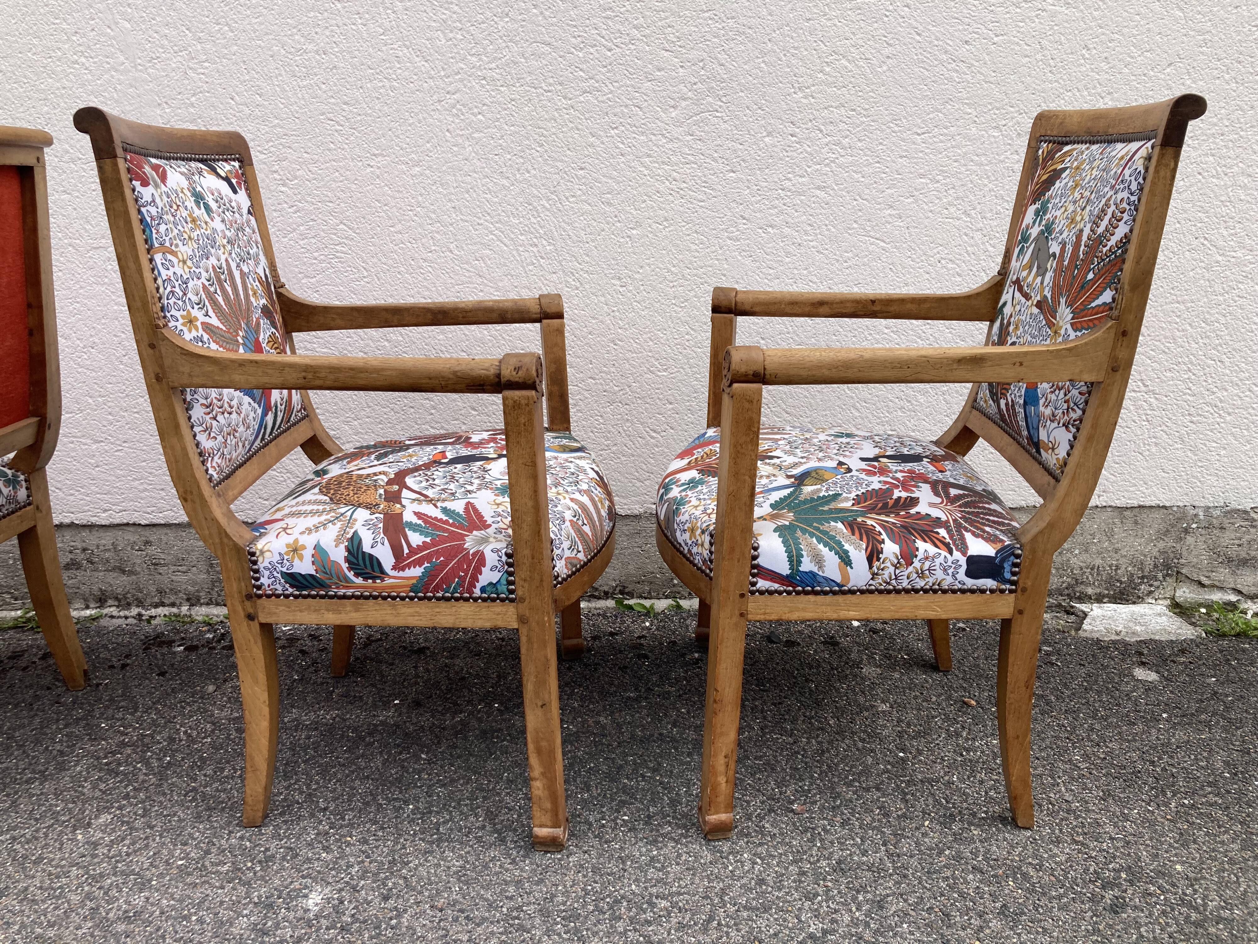 Set of four reupholstered Directoire period armchairs.