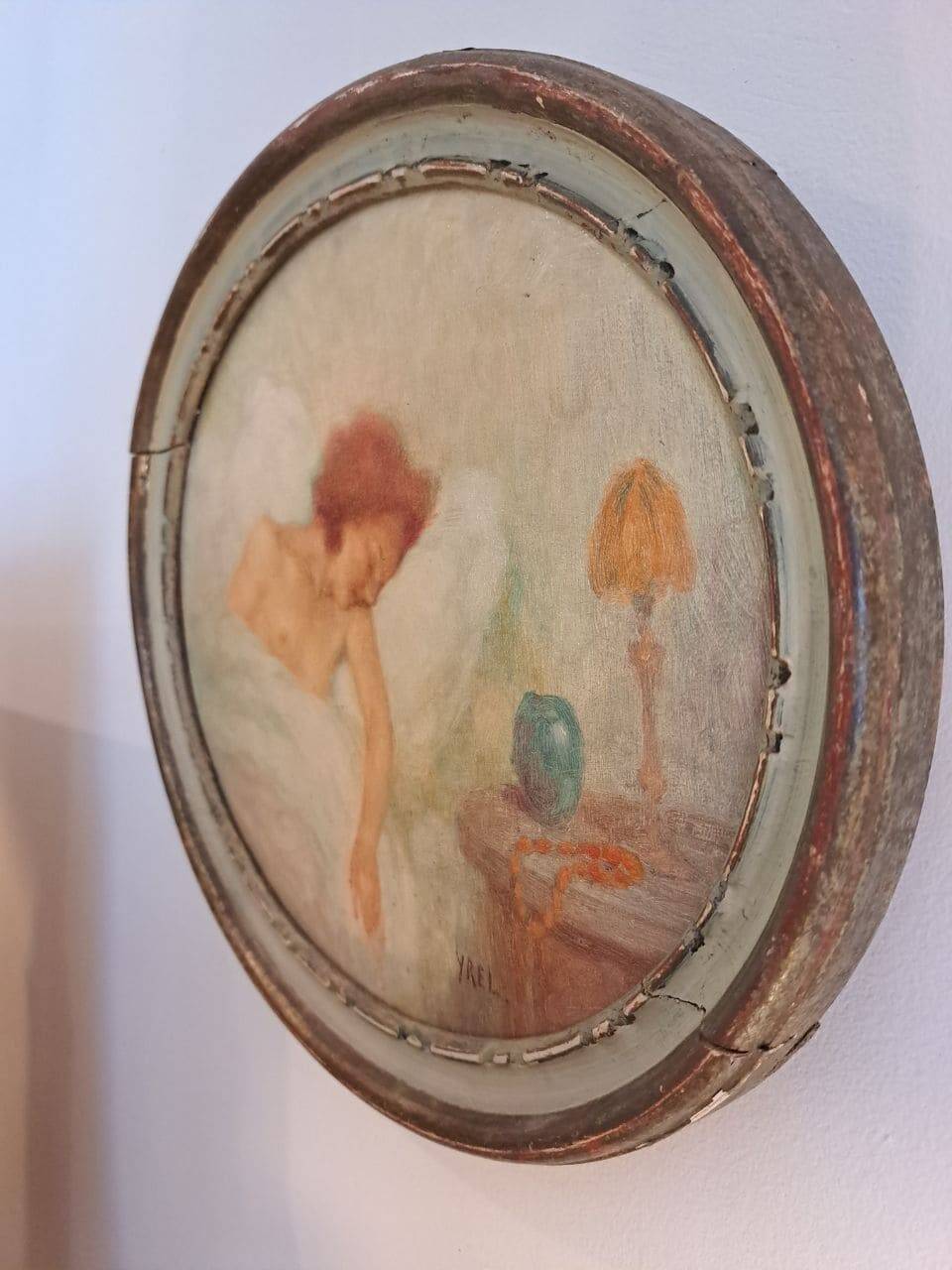 Ancient oval painting of a sleeping woman in oil on wood panel.