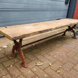 French country style cast iron garden bench with old barn wood plank