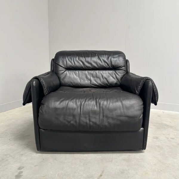 Black leather lounge chair by Dreipunkt, 1970s