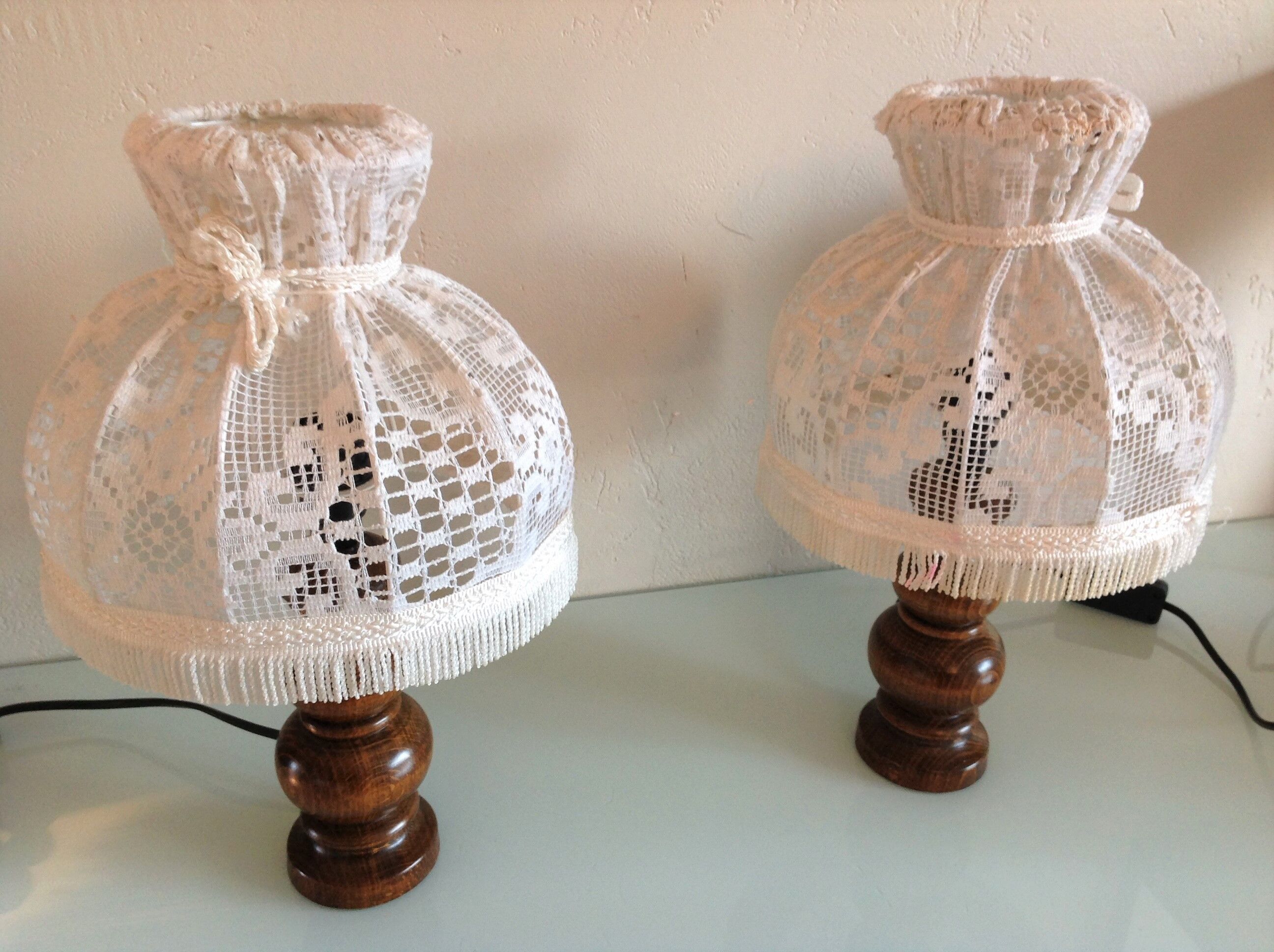 Pair of turned wooden bedside lamps and lace/vintage lampshade 60s-70s