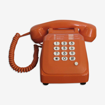 Téléphone orange à touches Socotel vintage