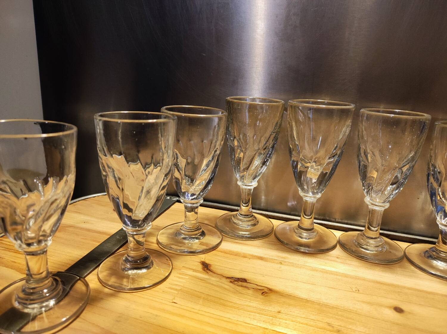 12 small twisted bistro glasses, 19th century