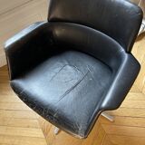 Swivel leather armchair