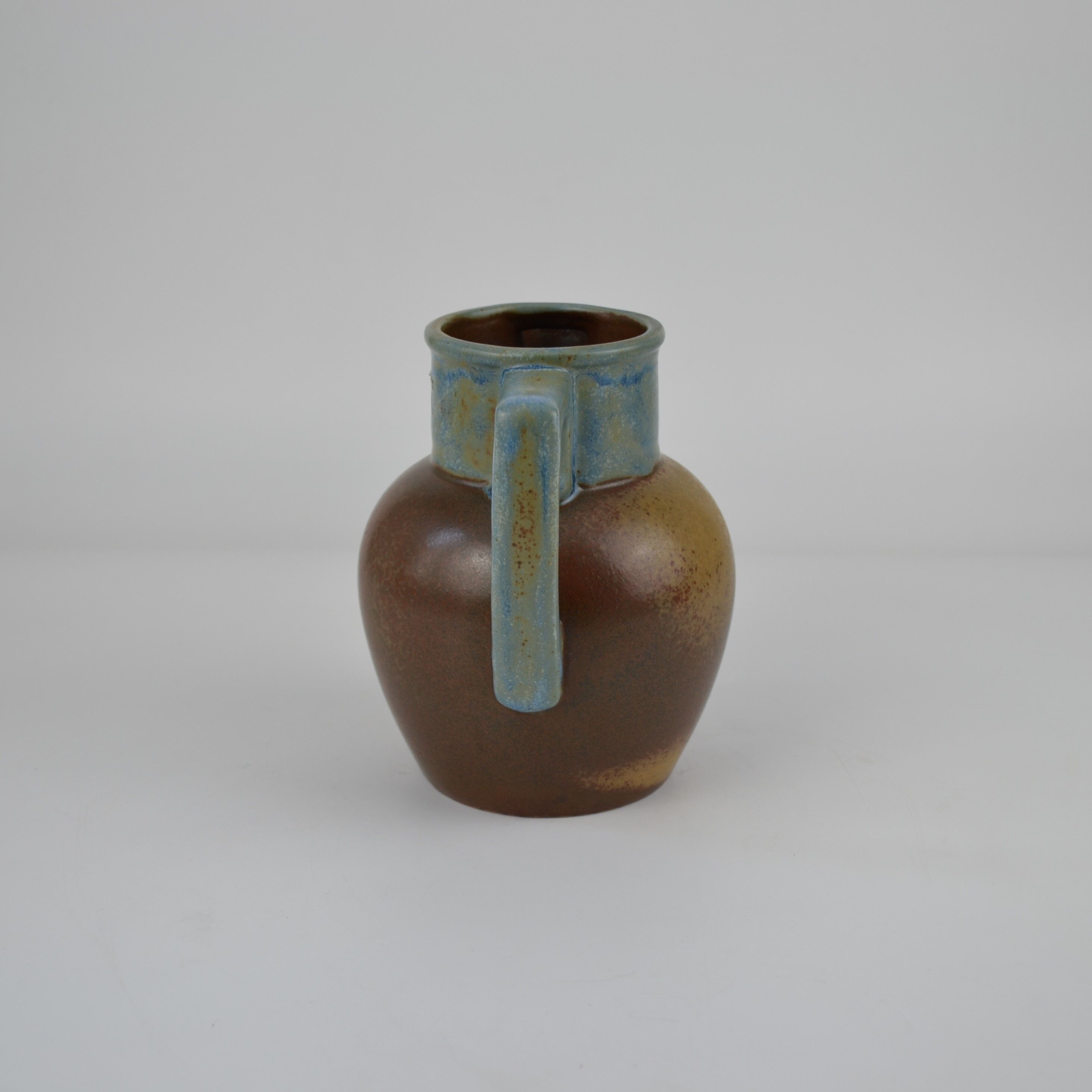 Two-tone stoneware pitcher by Louis Lourioux