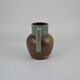 Two-tone stoneware pitcher by Louis Lourioux
