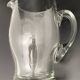 Glass jug with chiseled pattern