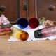 Four handmade colored tall glasses