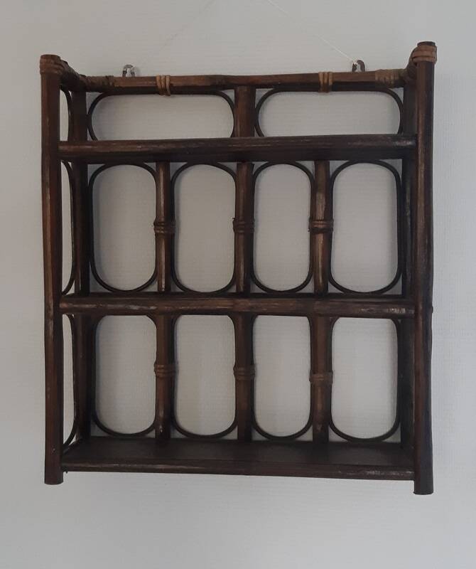 Rattan wall shelf from the 70s.