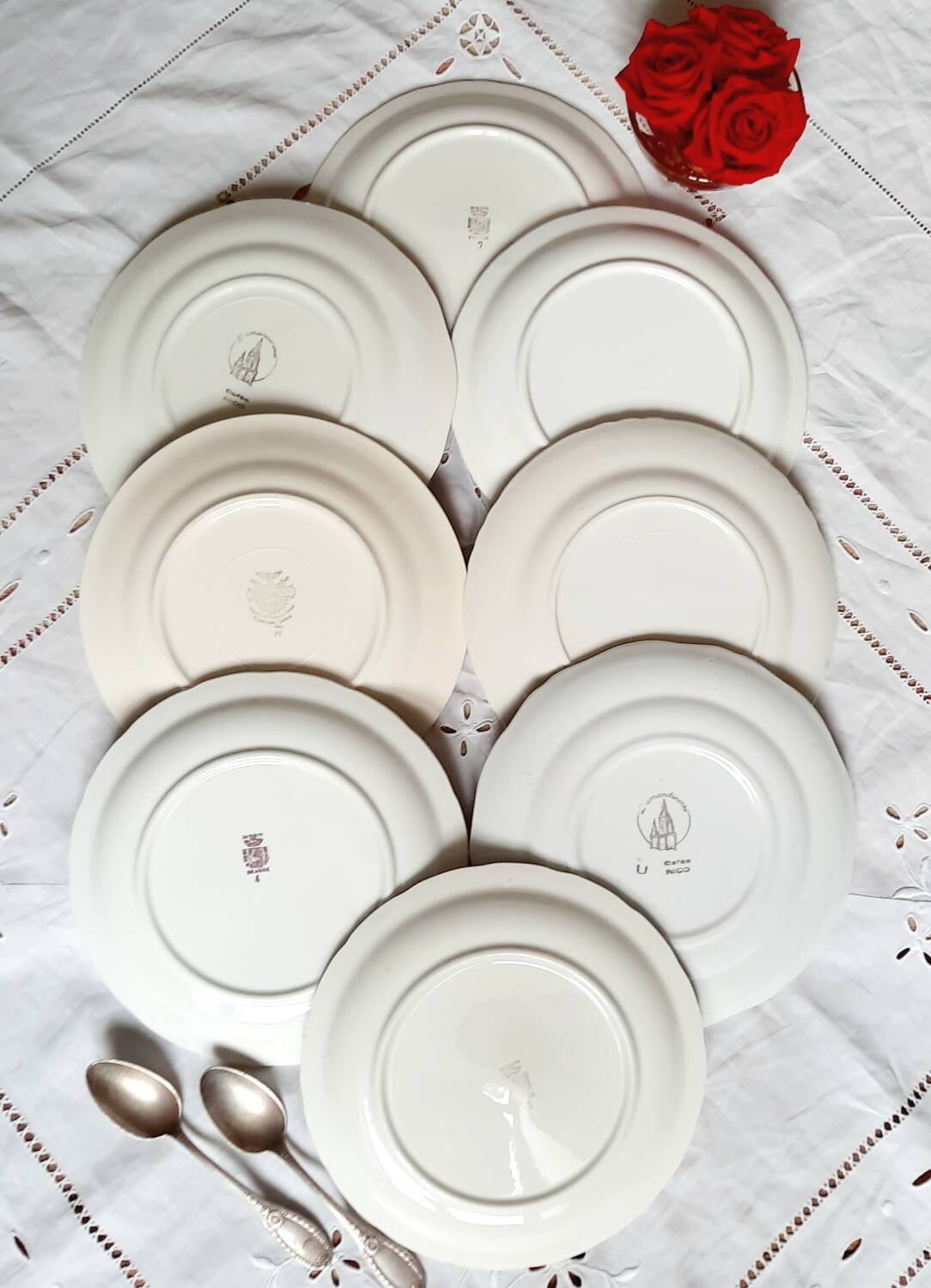 Old mismatched earthenware dessert plates with gold accompanied by a dish