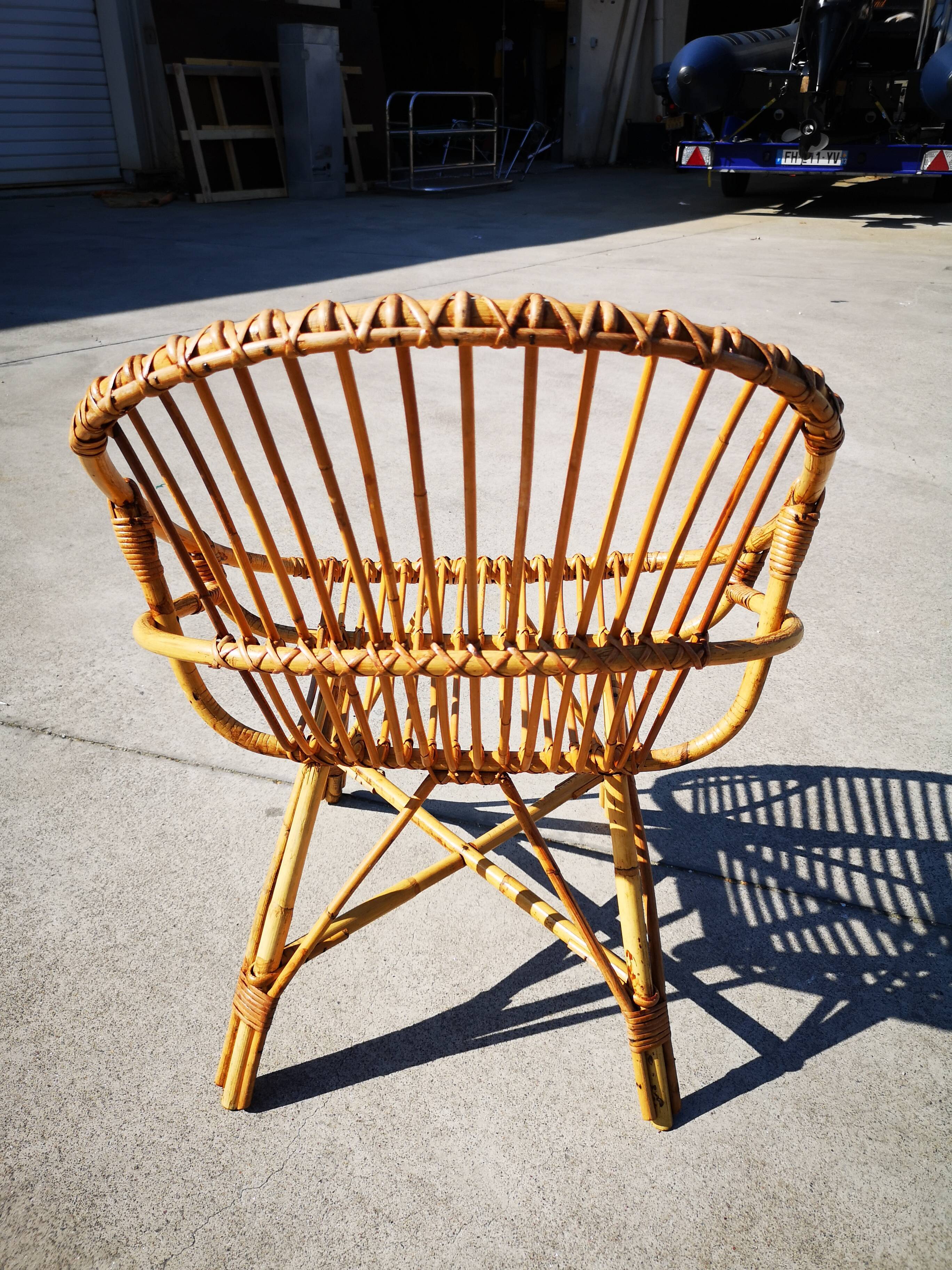Four rattan chairs