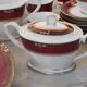 Elegant mid-century Japanese bone china service for 12 in white and noble red