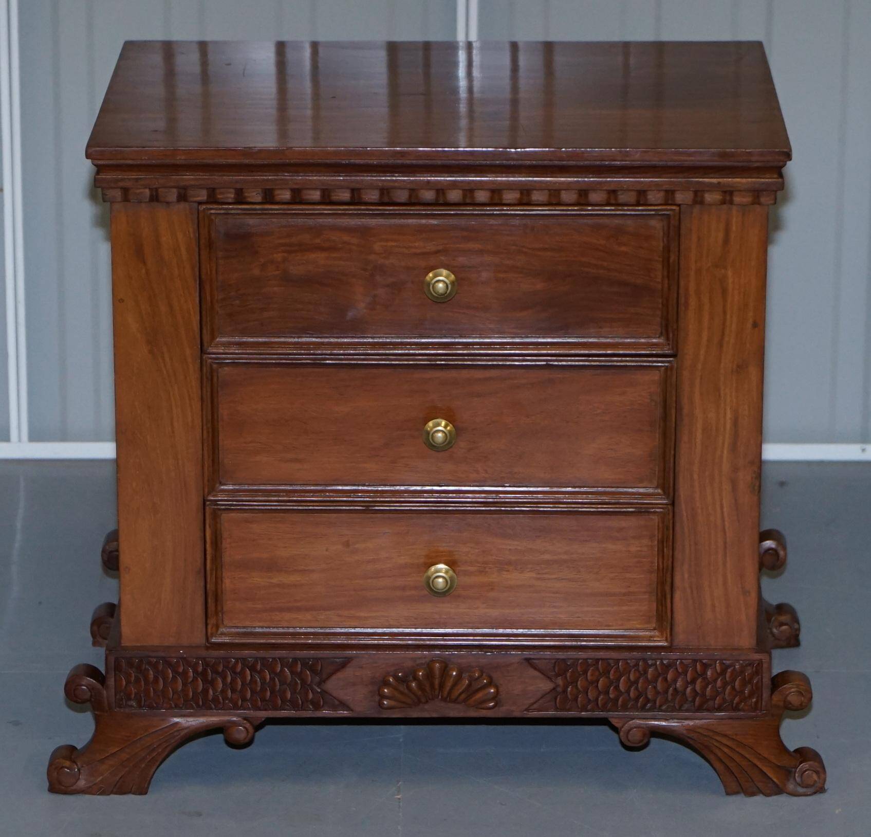 Set of hardwood dressers with finely carved bases.