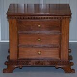 Set of hardwood dressers with finely carved bases.