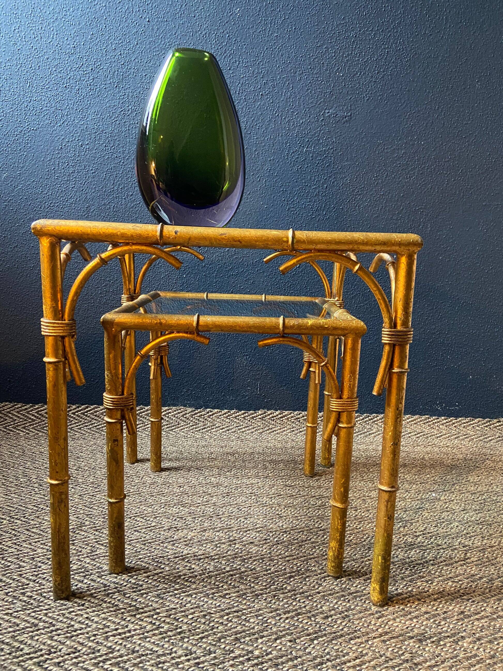 Pair of nesting tables in faux bamboo with glass tops, France, 1960s.