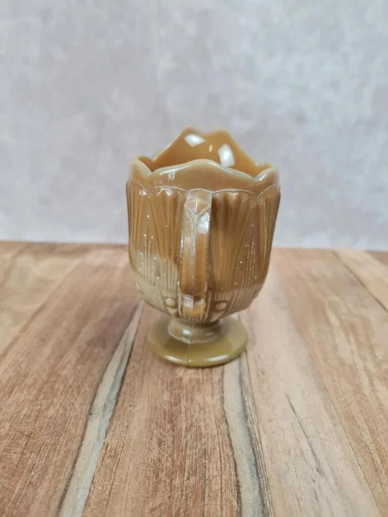 Small antique pressed glass jug in honey colour – moulded decoration