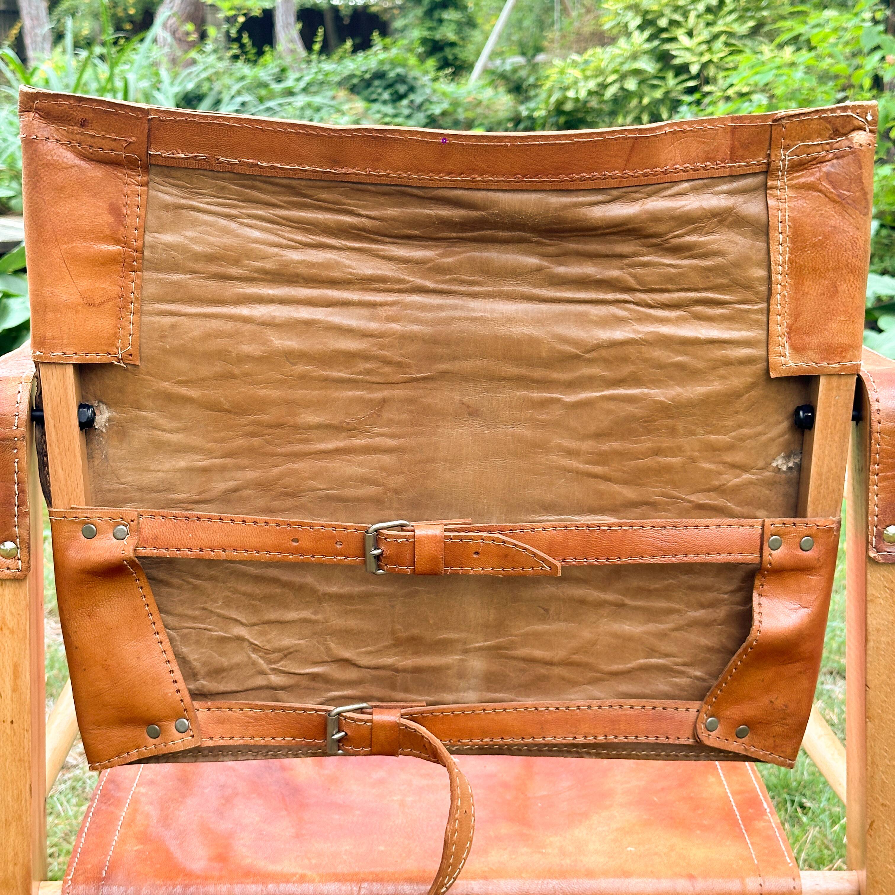 A pair of Danish beechwood and leather Safari armchairs - 1960