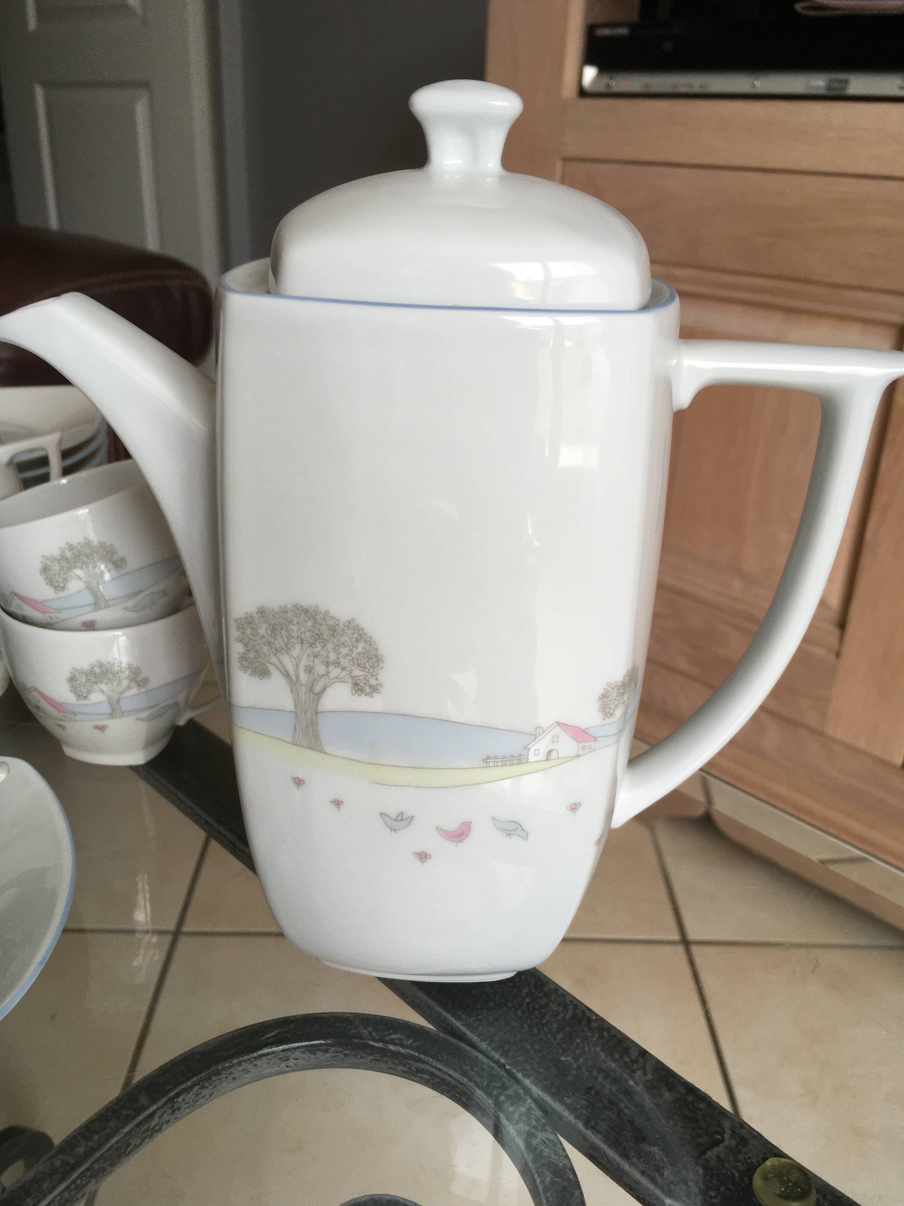 Limoges porcelain coffee service by Philippe Deshouilières