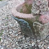 Medicis stone planters with old tree trunk decor