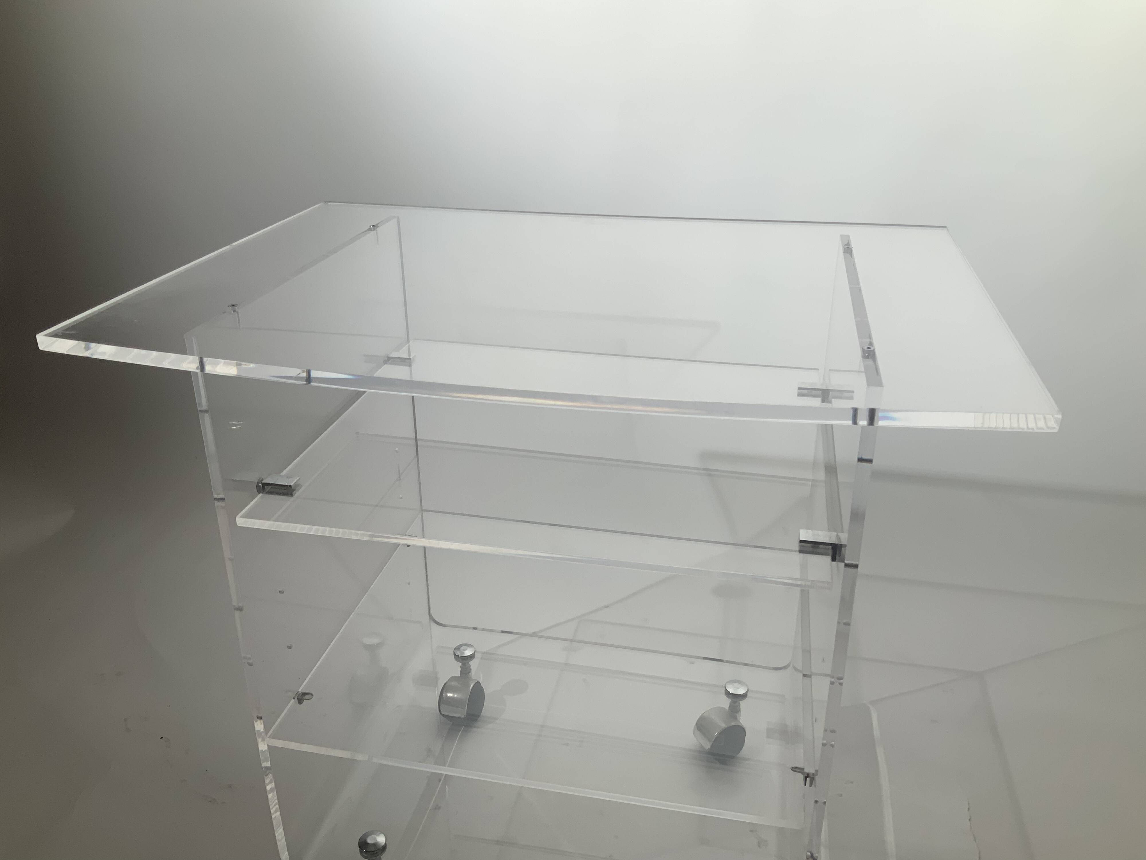 Dessert meuble TV Plexiglas David Lange
