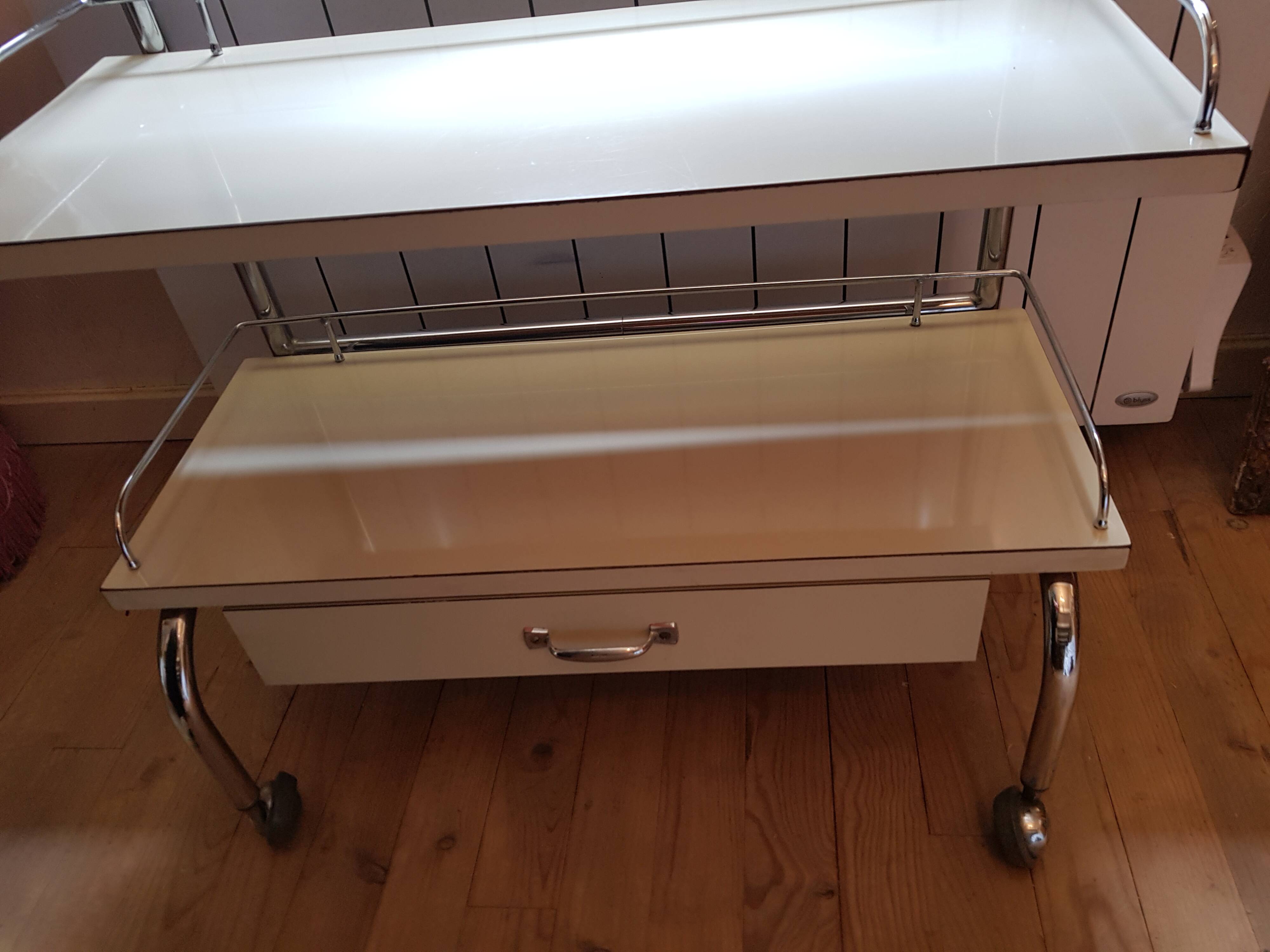 Rolling serving table with drawer