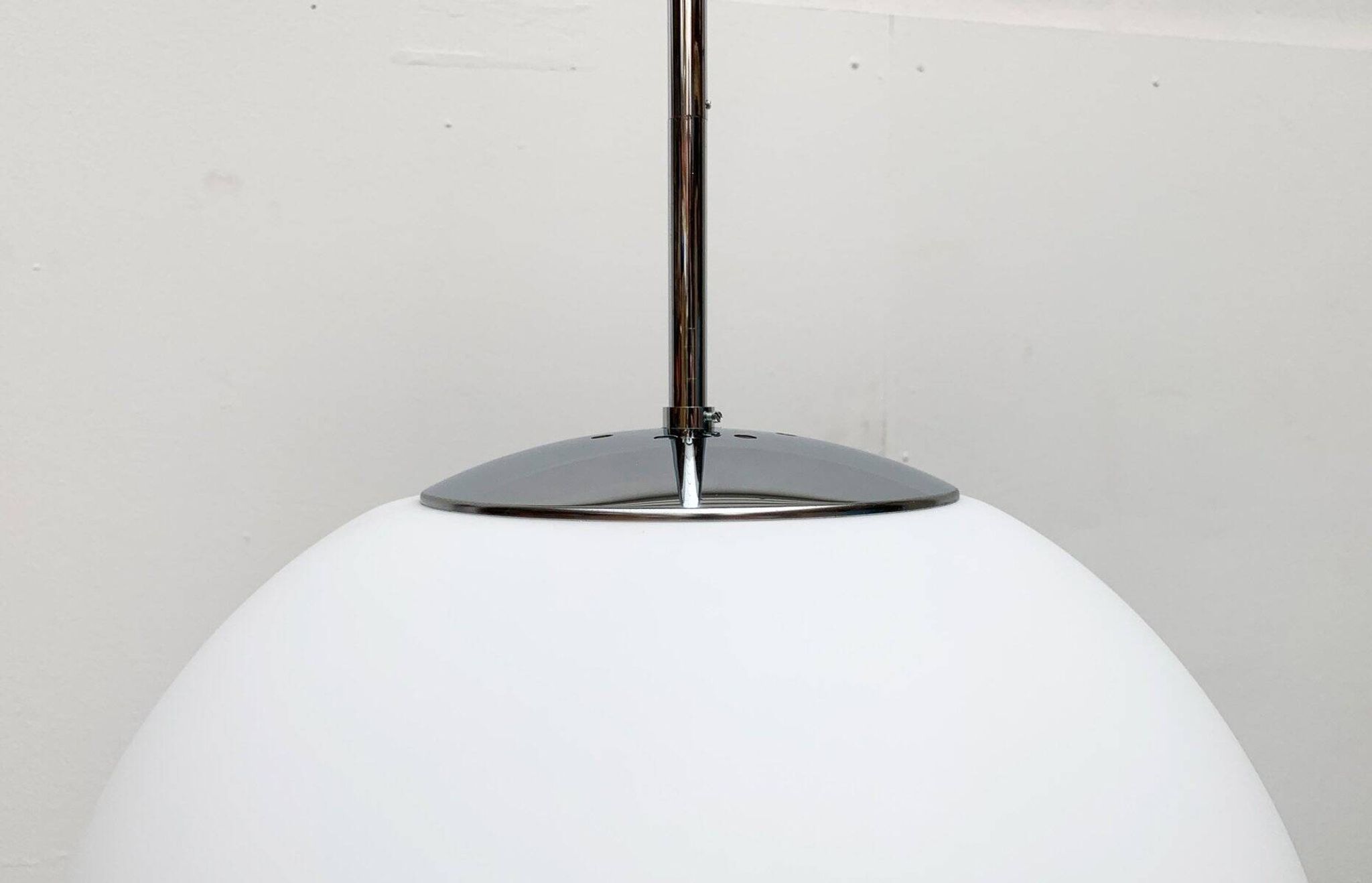 Vintage German space age glass ball pendant lamp by Limburg.