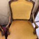 Pair of faux Louis XV armchairs in fully carved walnut