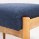 Pair of vintage navy blue wool stools from the mid-20th century, Edmund Homa, 1960s.