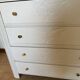 Restored wooden art deco chest of drawers with gilded handles