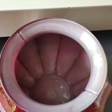 Gadrooned ball vase, in lacquered Art glass. Decor: pink tones of smoke, gold powder inclusions. Signed Sylvie Montagnon. Size 20 x 20 cm