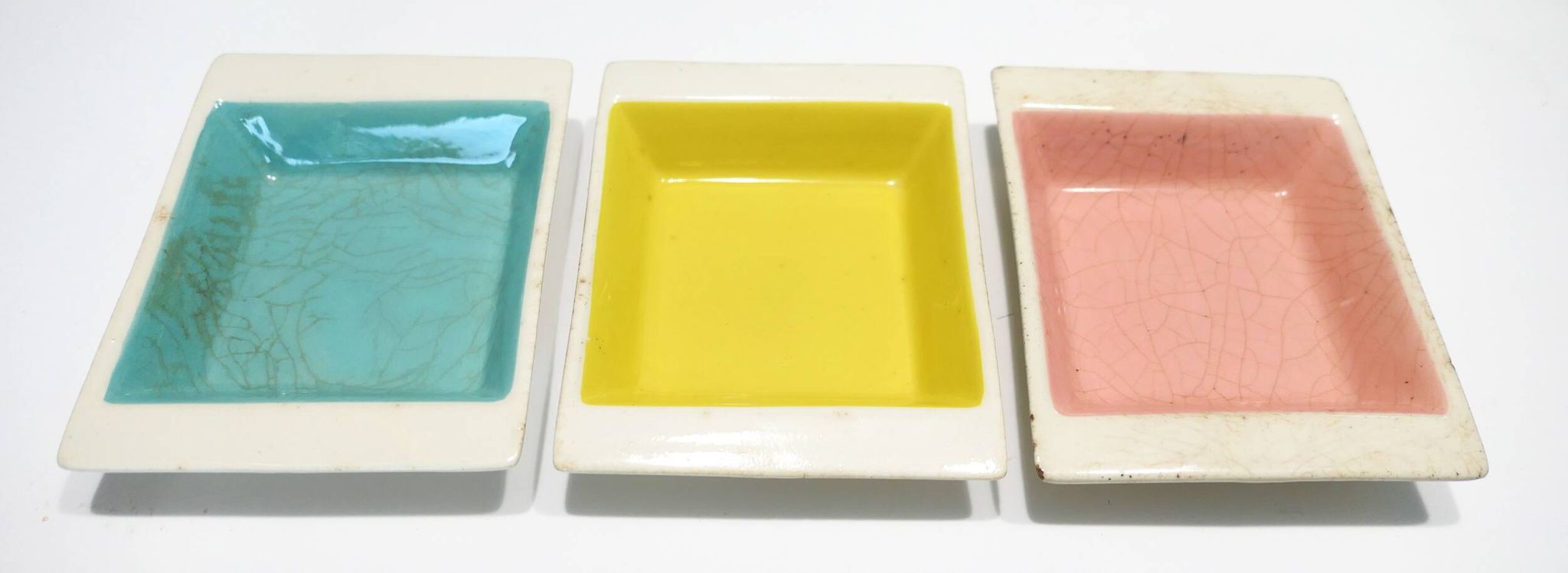 Set of three German ceramic catchalls from the 1950s.