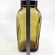 3 molded amber glass pharmacy bottles • Bakelite stoppers • 1950