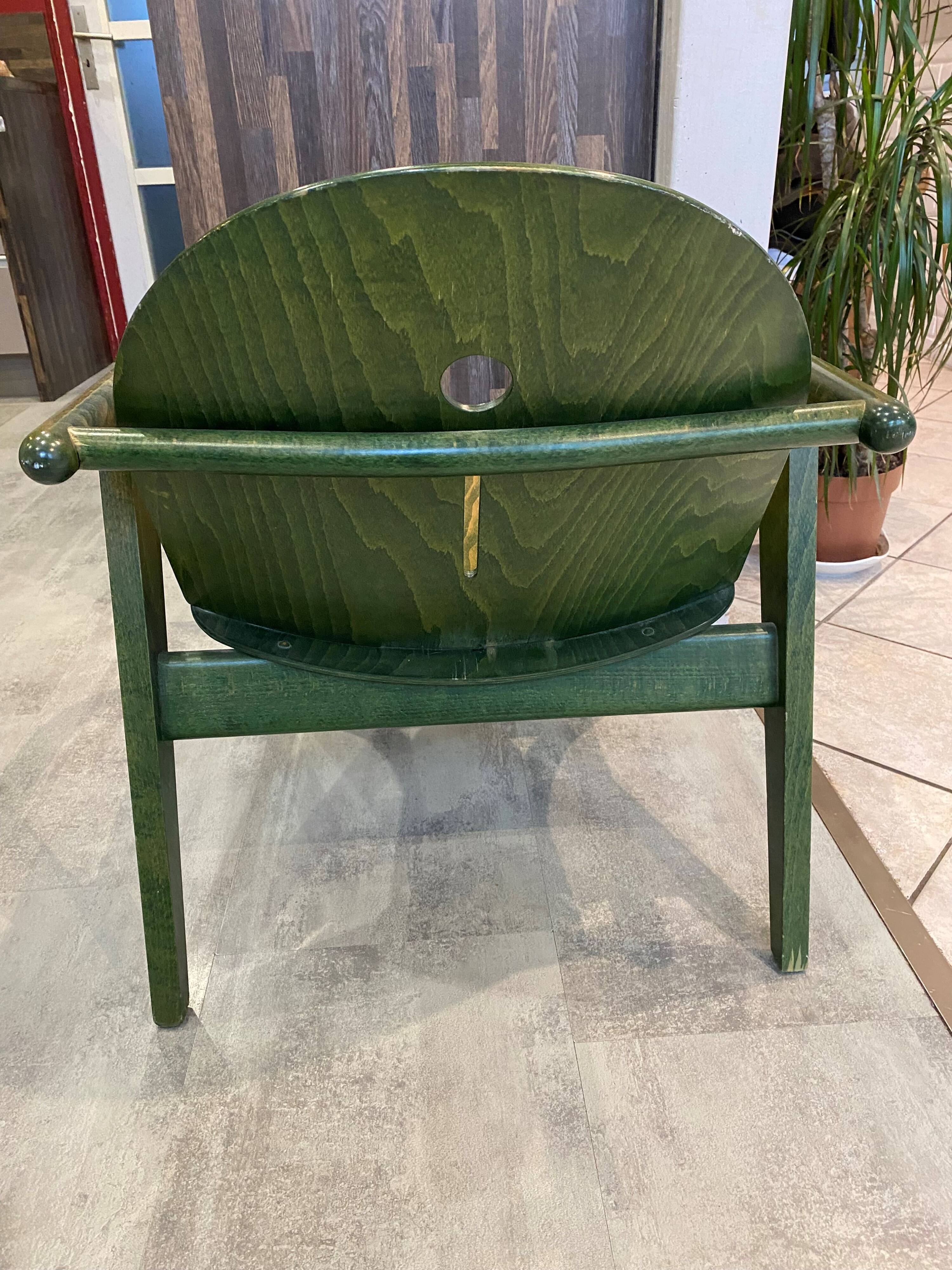 Fauteuil Baumann vert, années 70