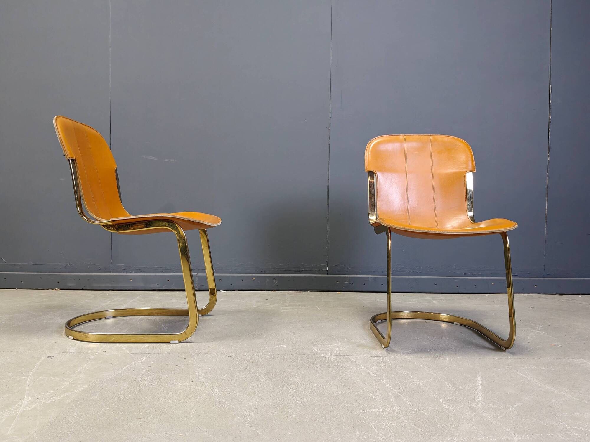Vintage brass and cognac leather dining chairs by Willy Rizzo for Cidue set of 4