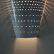 White lacquered perforated sheet metal applique in new condition.